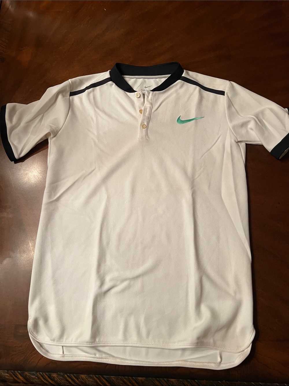 Nike Men’s White Polo with Teal Swoosh and Black Trim